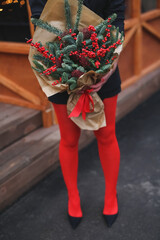 beautiful woman in Christmas style. Girl walk at the street in new year mood