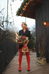 beautiful woman with Christmas tree, happy new year