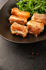 Fried fish rock eel fish rock salmon shark seafood small-spotted catshark portion size natural product tasty snack fresh gourmet food background on the table rustic view copy space pescetarian diet