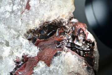 Fluorite, hematite and quartz aggregate with goethite inclusions