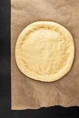 Raw pizza dough making pizza base tasty snack fresh delicious gourmet food background on the table rustic top view copy space