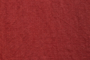 Fototapeta premium Red linen fabric texture close up as background or wallpaper of