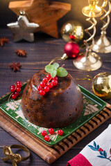 Fruit cake pudding traditionally served as part of Christmas dinner