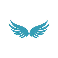 A pair of stylized turquoise blue angel wings spread open against a stark black background creating a powerful and elegant graphic design element symbolizing freedom and aspiration