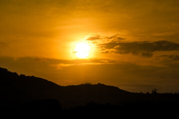 Dramatic Sunset Silhouette Hills
