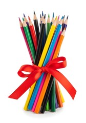Fototapeta premium colored pencils tied with a ribbon, isolated on white