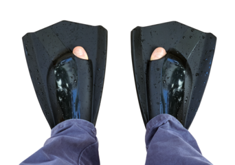 Person wearing black swim fins with toes sticking out, water drops visible on surface. Concept of diving, snorkeling, equipment, and unusual footwear. Isolated on a transparent background. PNG file.