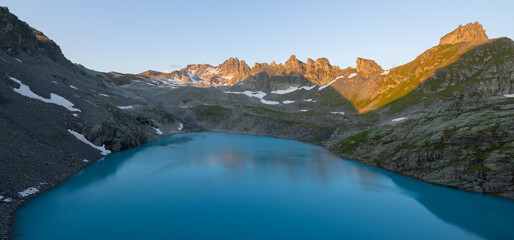 Alpine Lake Wildsee under the Pizol in the mountain range Glarus Alps - Canton of St. Gallen,...