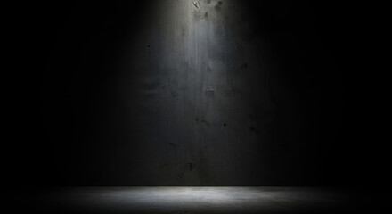 Obraz premium Dramatic spotlight beam illuminating a dark stage with a subtle glow effect