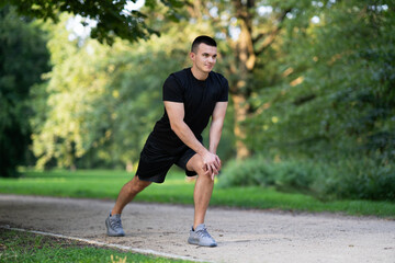 Man exercising in park