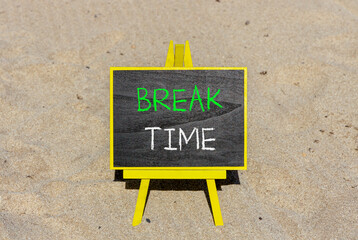 Break time symbol. Concept word Break time on beautiful black blackboard. Beautiful sand beach...