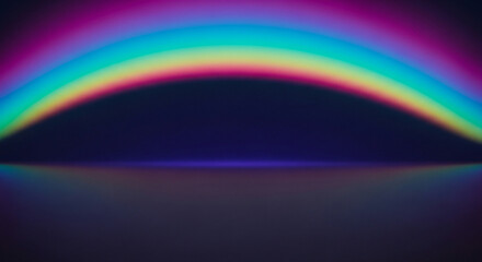 Vibrant rainbow arc reflecting on dark surface