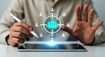 Person using a stylus on a tablet with a target graphic overlaying the screen and hand gesture shown on transparent background