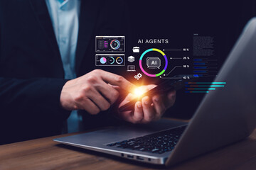 Businessman using smartphone with holographic AI agents dashboard and data visualization with laptop. Concept of artificial intelligence assistant, automation, business analytics, and innovation.
