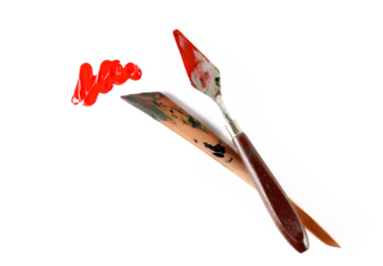 Metal and wooden spatula with red brush strokes acrylic paint isolated on white, top view