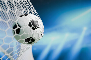 Soccer ball hitting the net under bright stadium lights, goal, victory, and excitement in a football match. Perfect sports background for competition and success themes. Goal scored. Football, concept