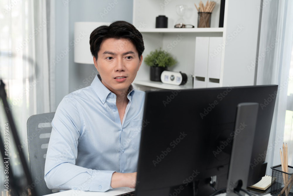 Aufkleber serious smart businessman working on computer to check email with business project report, analyzing