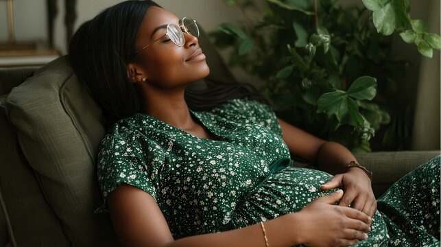 Tender animated couple sharing intimate pregnancy moment with pregnant woman in yellow dress and partner in checkered shirt in cozy medical waiting room