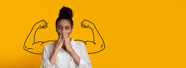 A young African American woman with a surprised expression places hands over mouth against yellow backdrop. Bold arm graphics symbolize strength, capturing a moment of empowerment and spirited joy.