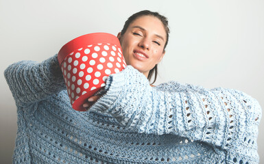 Merry young woman wear sweater. Christmas gift. Holidays. New Year. 