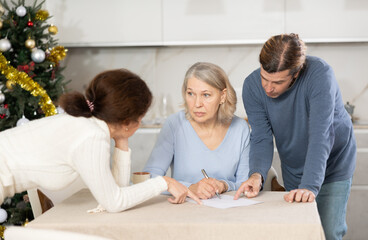Adult married couple helps elderly woman make will testament, declaration for loan, application for...
