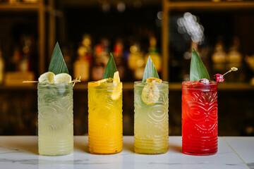 Colorful tiki cocktails with tropical garnishes on bar counter, vibrant and refreshing