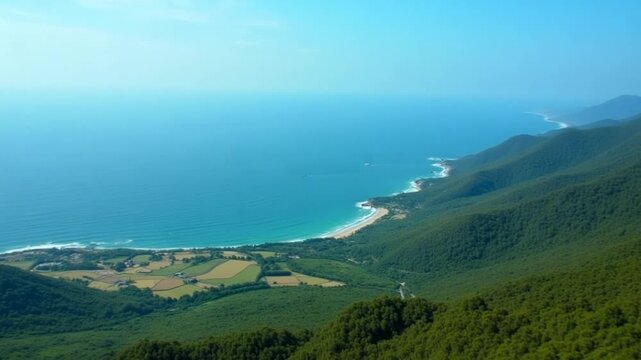 Aerial natural landscape of a hilly region and beautiful blue sea on a summer sunny day. Shot. Flying above green hills and agriculture fields towards the sea.