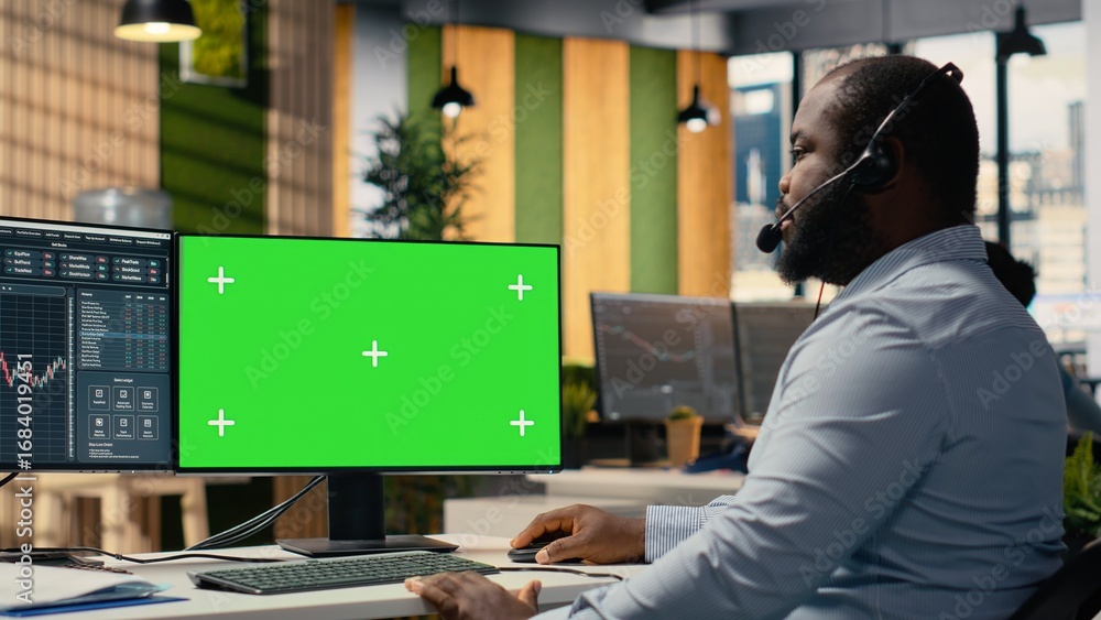Poster investment consultant talking in headset mic, using green screen pc, reviewing client portfolio. tra