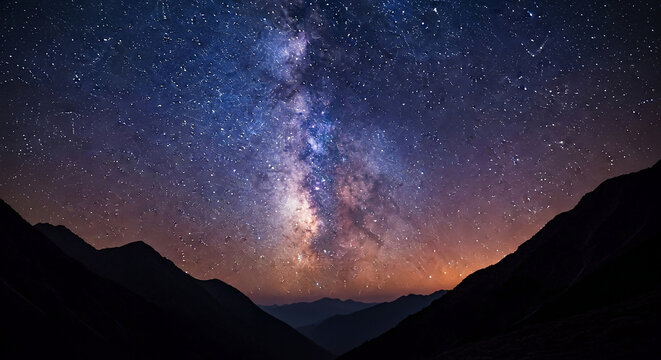 Night sky filled with stars and the Milky Way galaxy over dark mountain silhouettes, showcasing vastness and celestial beauty, ideal for travel or astronomy themes