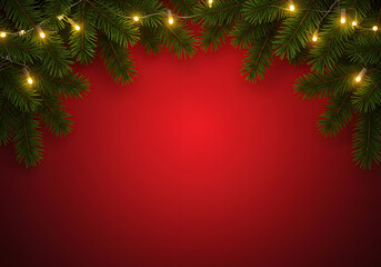 Pine branch on red Christmas background Green pine branch with red holiday background space