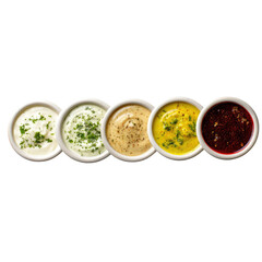 Five small white bowls of various sauces, arranged in a horizontal row.  Creamy, mustard, and tangy sauces are visible
