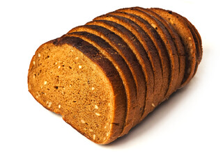 Tasty sliced rye bread loaf with nut pieces on a white background. Healthy food. High grain product. Bakery item.