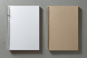 Two spiral-bound notebooks, one white, one kraft