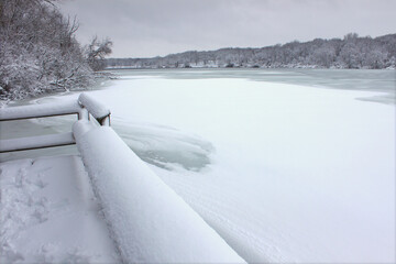 Freshly fallen snow on Pierce Lake at Rock Cut State Park in Illinois