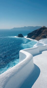 Whitewashed balcony overlooking a turquoise Aegean Sea