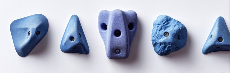 Assorted light purple/blue climbing holds