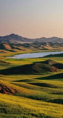 Fototapeta premium Gentle hills and a serene lake in a sunlit landscape