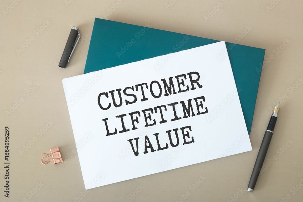 Poster concept of customer lifetime value write on sticky notes isolated on wooden table