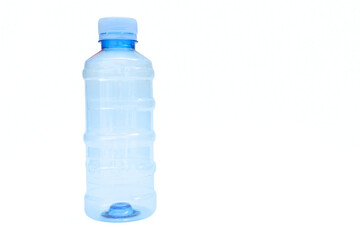 Empty plastic mineral water bottle on white background