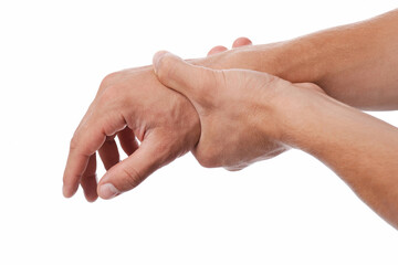 Young european man suffer from wrist pain and pressing hand to sore spot, isolated on white...