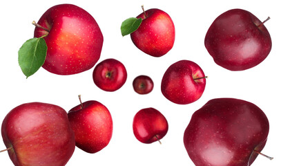 Fresh red apples swirling in air against white background