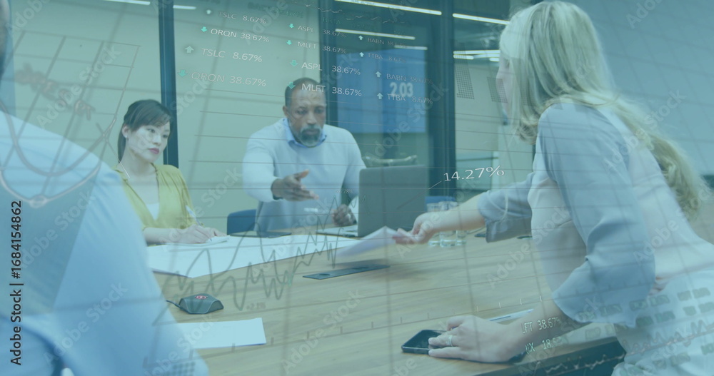 Poster Discussing team in business attire analyzing financial data at table in meeting room with documents