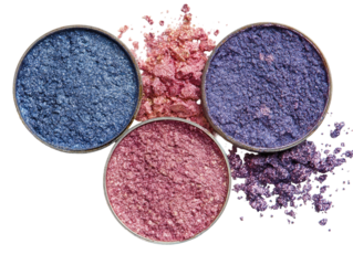 Close-up of three eyeshadow palettes.  Various shades of pink and blue eyeshadow