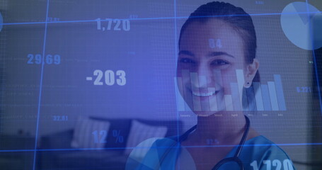 Smiling South Asian doctor wearing scrubs, stethoscope in lounge, showing data overlays, copy space