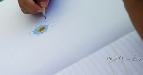 Gripping wooden pencil child hand sketching blue-petal flower doodle on paper, with sin2? equation