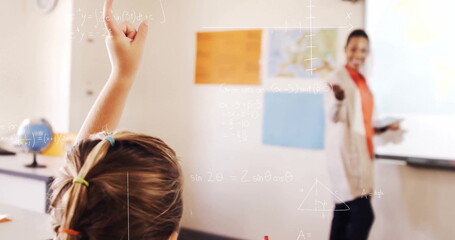 Elementary student raising hand in classroom at desk, with globe and whiteboard maps, copy space
