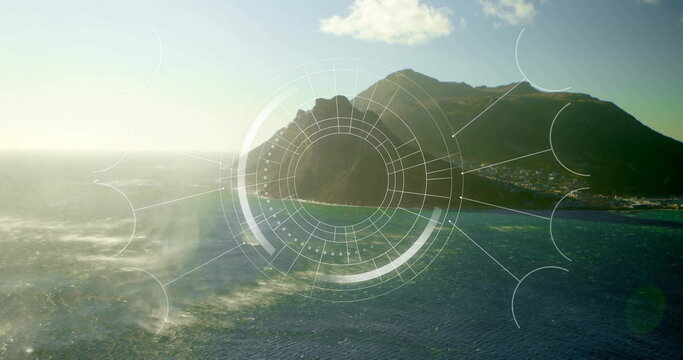 Showing rocky mountain coastline via HUD overlay at coast with whitecaps, settlement, cumulus cloud - Powered by Adobe