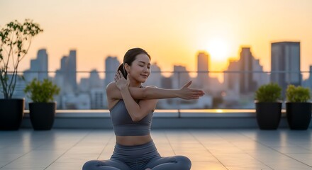 Fototapeta premium Woman Stretching on Rooftop at Sunrise.