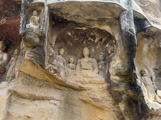 Buddha statue in Grotto 274 at Thousand-Buddha Cliff on bank of Jialing River in Guangyuan, Sichuan, China, constructed from late Northern Wei Dynasty.