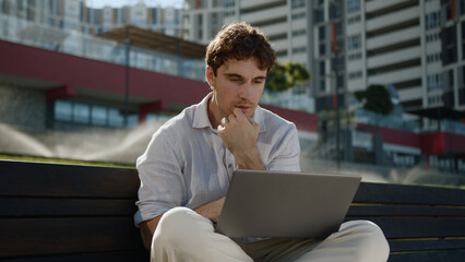 Happy Caucasian man working remote laptop computer entrepreneur smiling male guy freelancer...